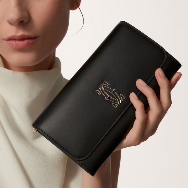 チェーンウォレット C ドゥ カルティエ  ブラック カーフスキン、ゴールド＆ブラックのエナメルフィニッシュ