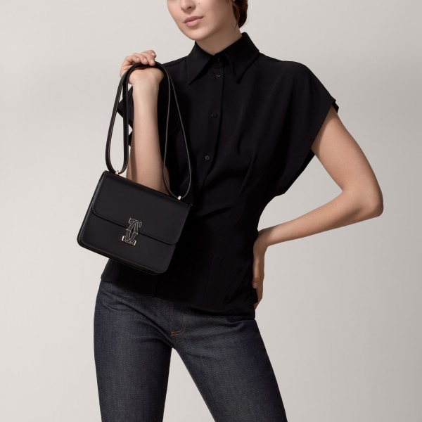 ミニ バッグ C ドゥ カルティエ  ブラック カーフスキン、ゴールド＆ブラックのエナメルフィニッシュ