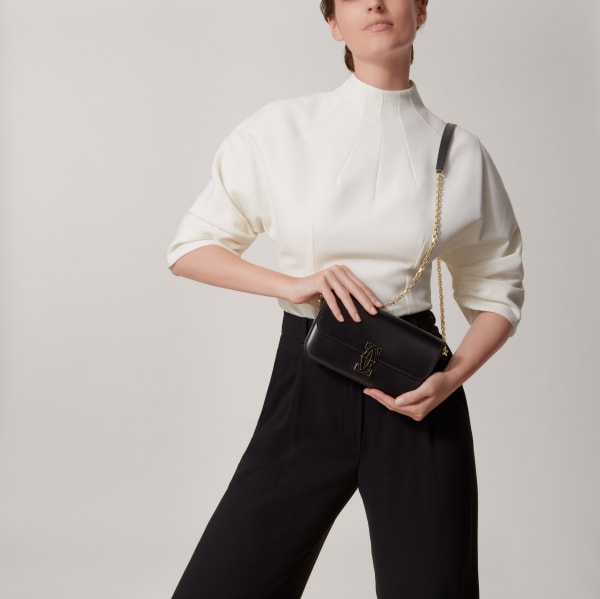 ミニ バッグ C ドゥ カルティエ  ブラック カーフスキン、ゴールド＆ブラックのエナメルフィニッシュ