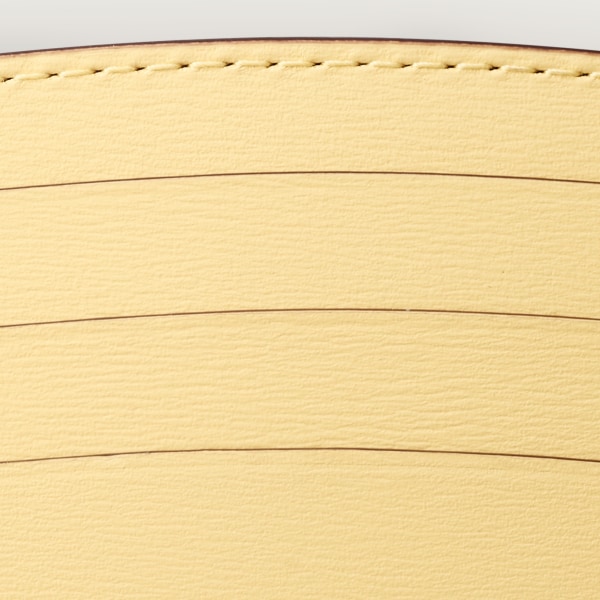 カード ホルダー パンテール C  ミモザイエロー カーフスキン、「Cartier」ロゴの箔押し、パラジウムフィニッシュ