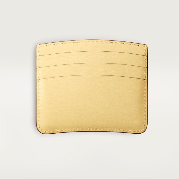 カード ホルダー パンテール C  ミモザイエロー カーフスキン、「Cartier」ロゴの箔押し、パラジウムフィニッシュ
