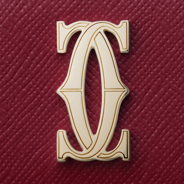 ウォレット C ドゥ カルティエ  チェリーレッド テクスチャー カーフスキン、ゴールドフィニッシュ