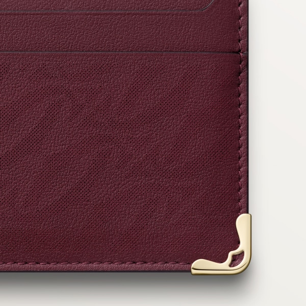 ダブル カードホルダー、マスト ドゥ カルティエ ボルドーカラー パンチング加工ロゴ カーフスキン、ゴールドフィニッシュ